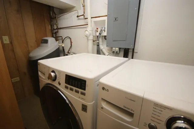 a utility room with dryer and washer