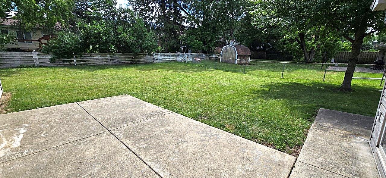 209 Gladys Avenue Fox River Grove, IL 60021 - Photo 23 of 23 a view of a garden with a slide