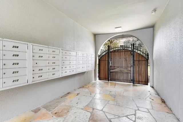 a view of a hallway with entryway