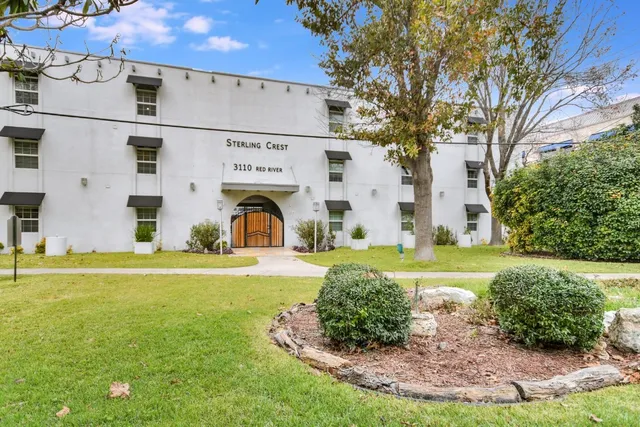 a view of a house with a garden