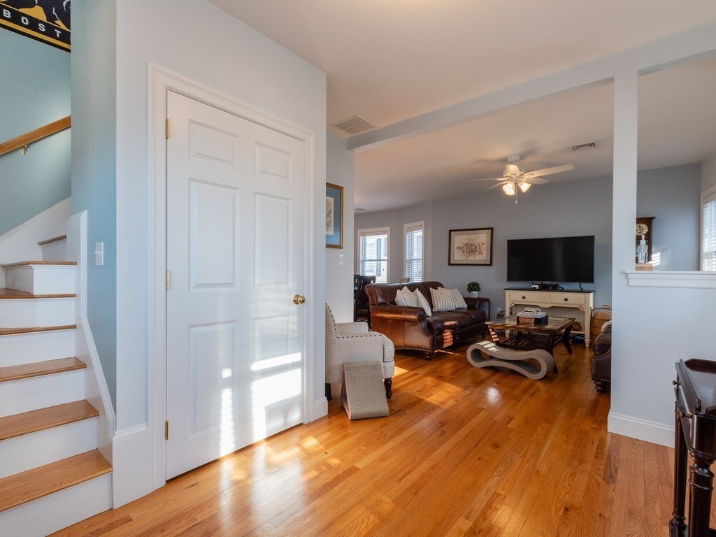 31-33 College Hill Road Somerville, MA 02144 - Photo 6 of 38 a living room with furniture and a flat screen tv