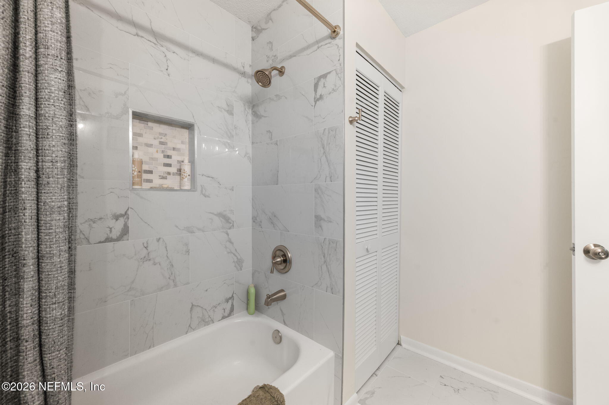 507 Gentian Road St. Augustine, FL 32086 - Photo 37 of 82 a bathroom with a bathtub and shower