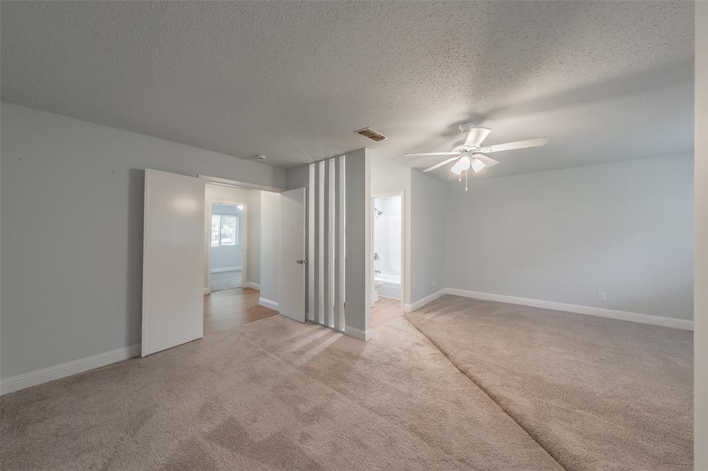 1301 Cedar Ridge Terrace Euless, TX 76039 - Photo 17 of 31 Spacious primary bedroom with room for sitting area.