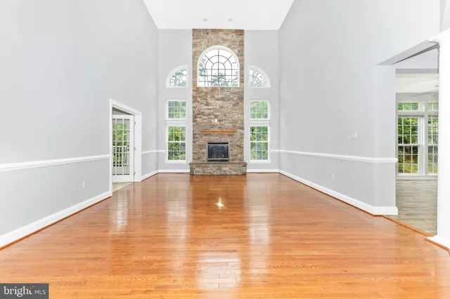 a view of an empty room with windows