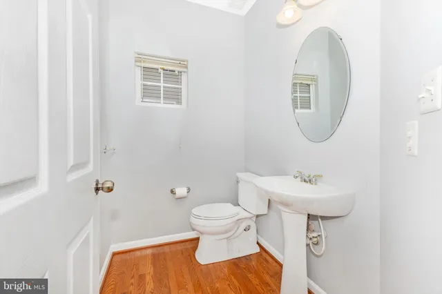 a view of a kitchen from the sink