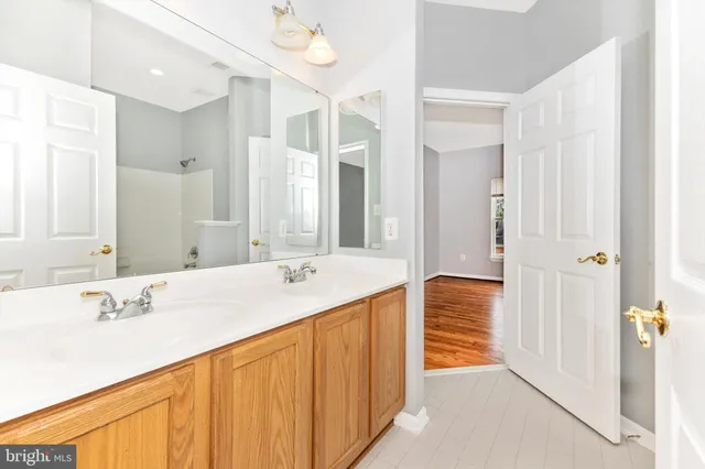 a kitchen with white cabinets