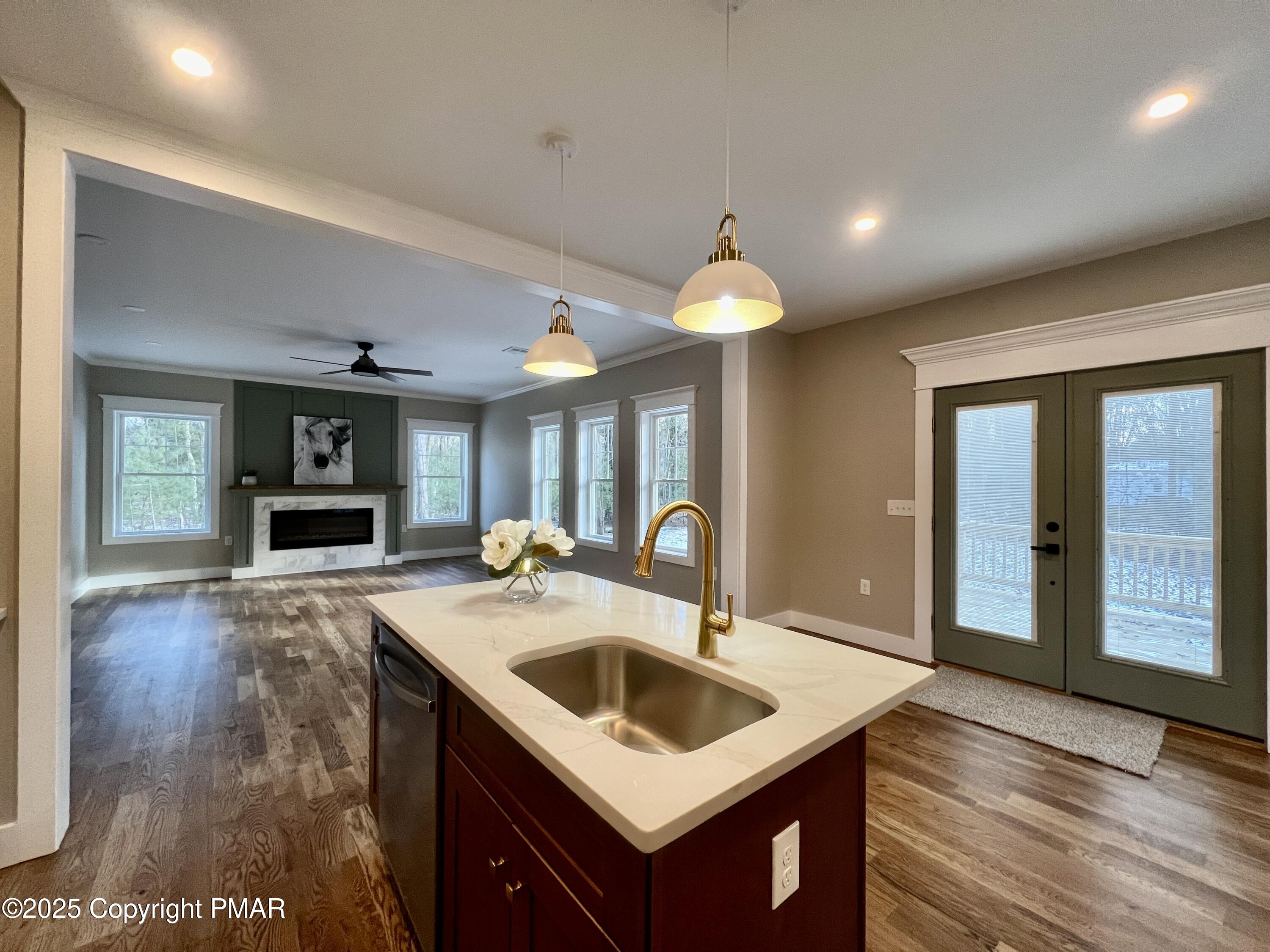 253 Hawthorn Lane Kunkletown, PA 18058 - Photo 14 of 39 a kitchen with sink cabinets and wooden floor