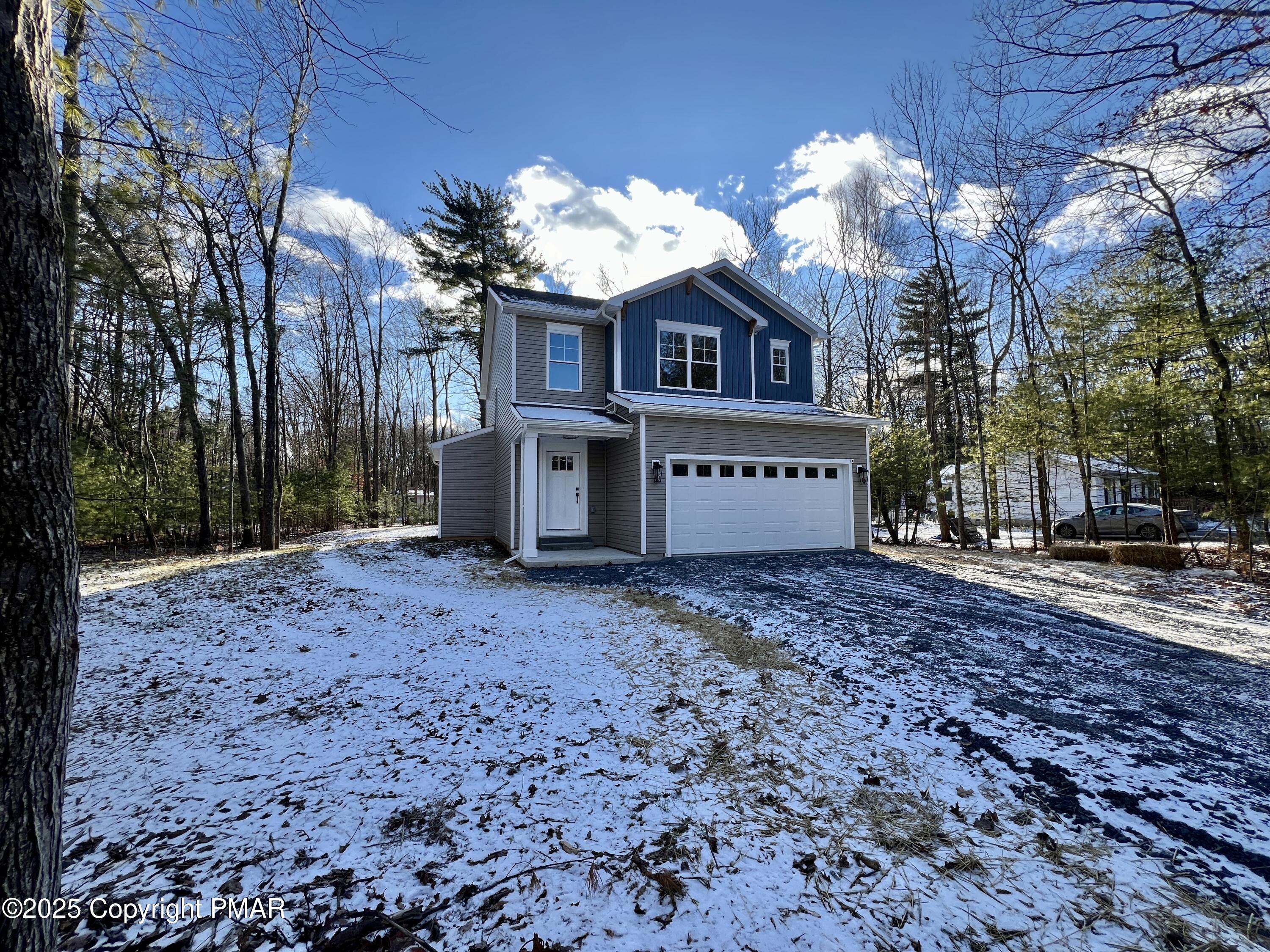 253 Hawthorn Lane Kunkletown, PA 18058 - Photo 4 of 39 a view of a house with a yard