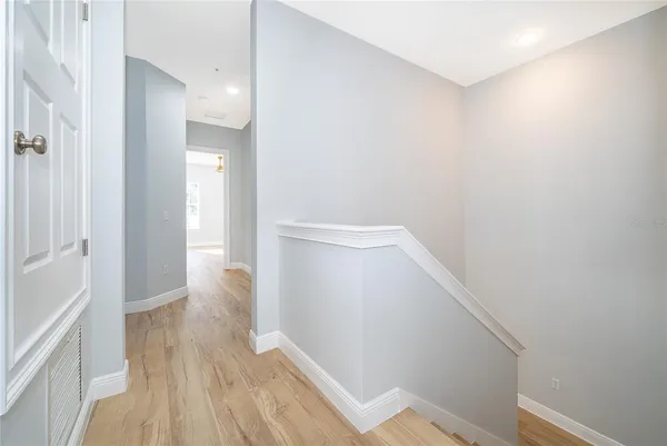 a view of small space with wooden floor