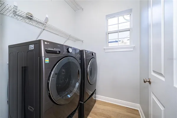 a utility room with dryer and washer