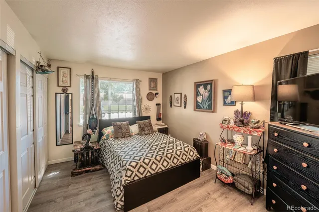 a bedroom with a bed and furniture