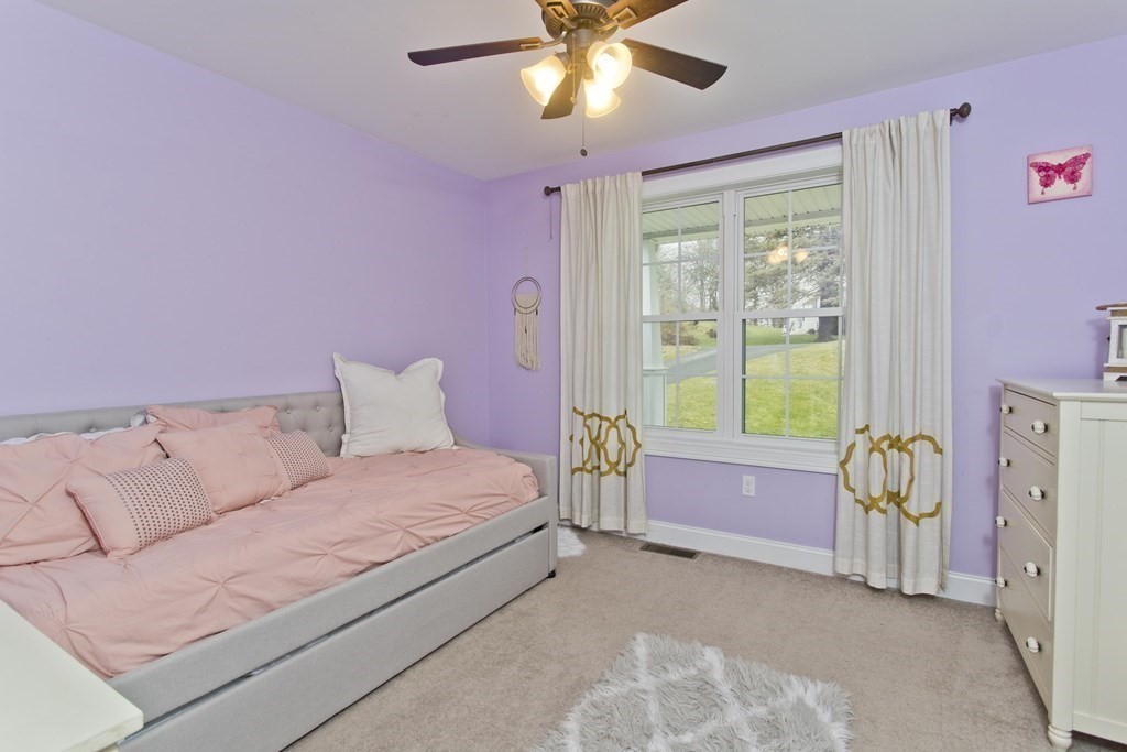 19 Valley Road Southampton, MA 01073 - Photo 21 of 32 a spacious bedroom with a bed and a window