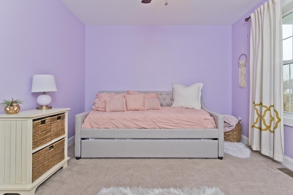 19 Valley Road Southampton, MA 01073 - Photo 22 of 32 a spacious bedroom with a bed and a window