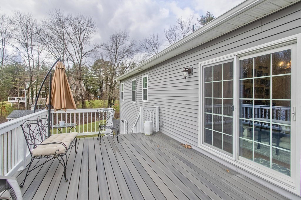 19 Valley Road Southampton, MA 01073 - Photo 29 of 32 a view of a deck with two couches and deck with wooden floor and fence