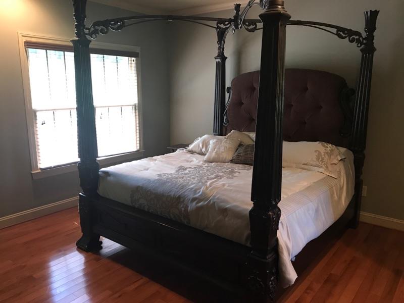 471 Ligon Road Lebanon, TN 37090 - Photo 12 of 18 a bedroom with a bed a window and a wooden floor