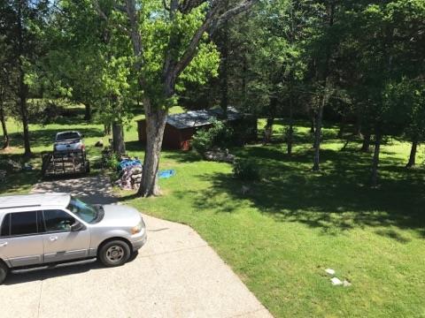 471 Ligon Road Lebanon, TN 37090 - Photo 4 of 18 a view of a yard with car parked