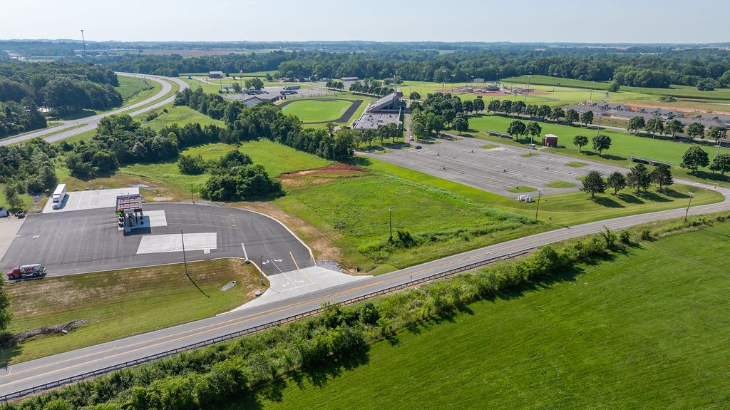 4300 Lafayette Road Hopkinsville, KY 42240 - Photo 4 of 7 an aerial view of a house with a garden