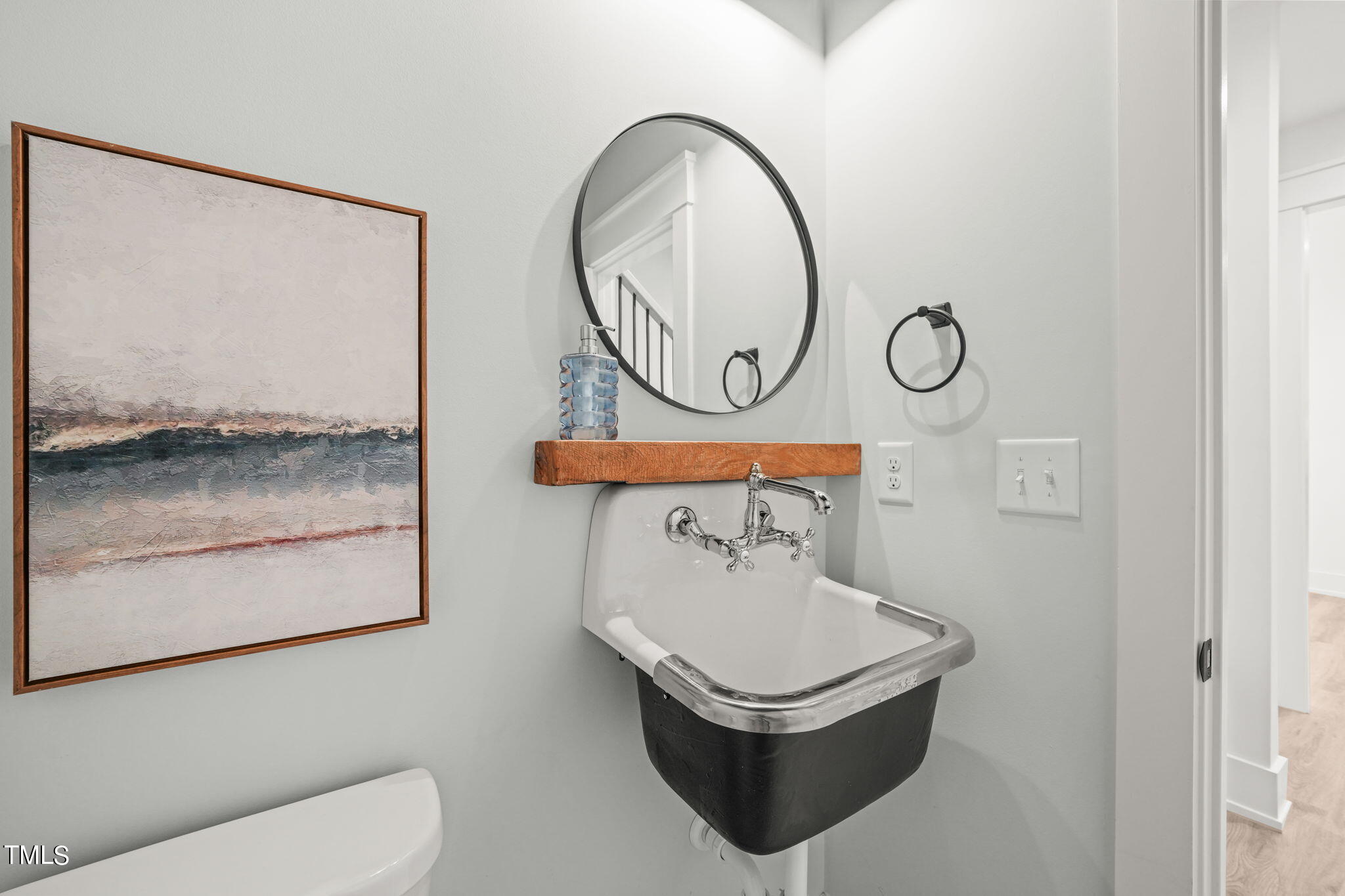 210 Pilot Ridge Road Zebulon, NC 27597 - Photo 27 of 46 a bathroom with a toilet sink and mirror