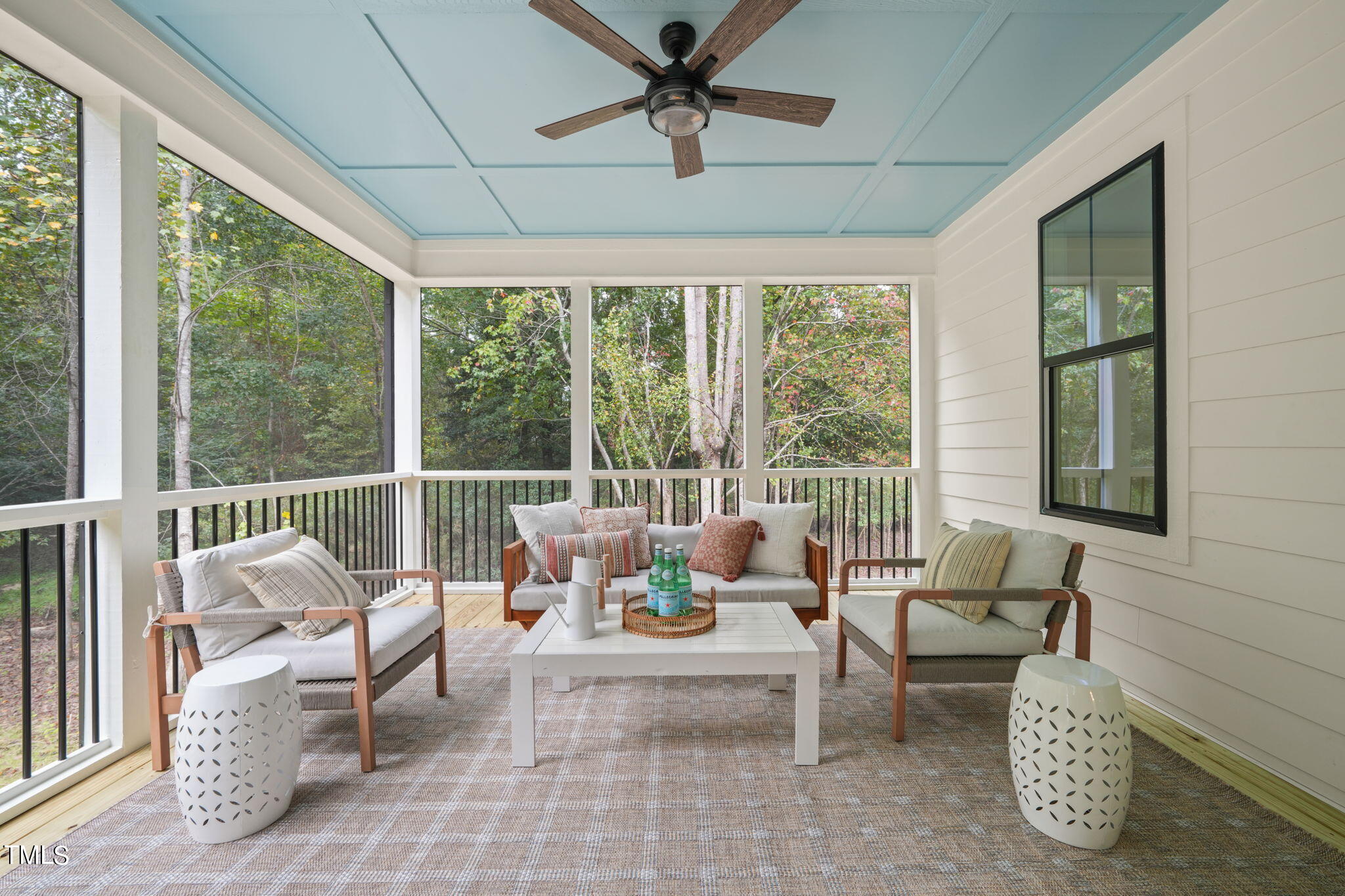 210 Pilot Ridge Road Zebulon, NC 27597 - Photo 38 of 46 a living room with furniture and a large window