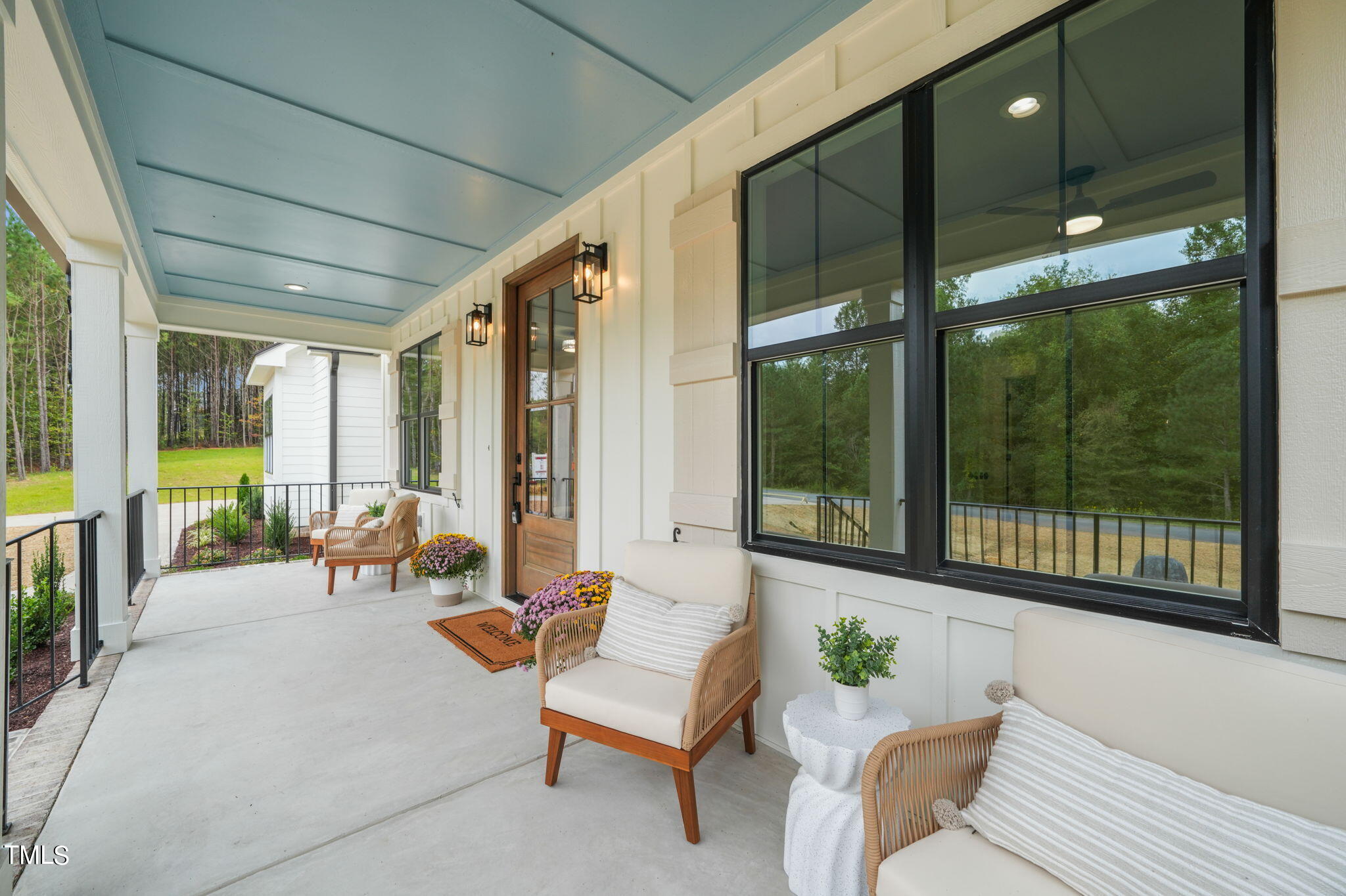 210 Pilot Ridge Road Zebulon, NC 27597 - Photo 5 of 46 a living room with furniture and a large window