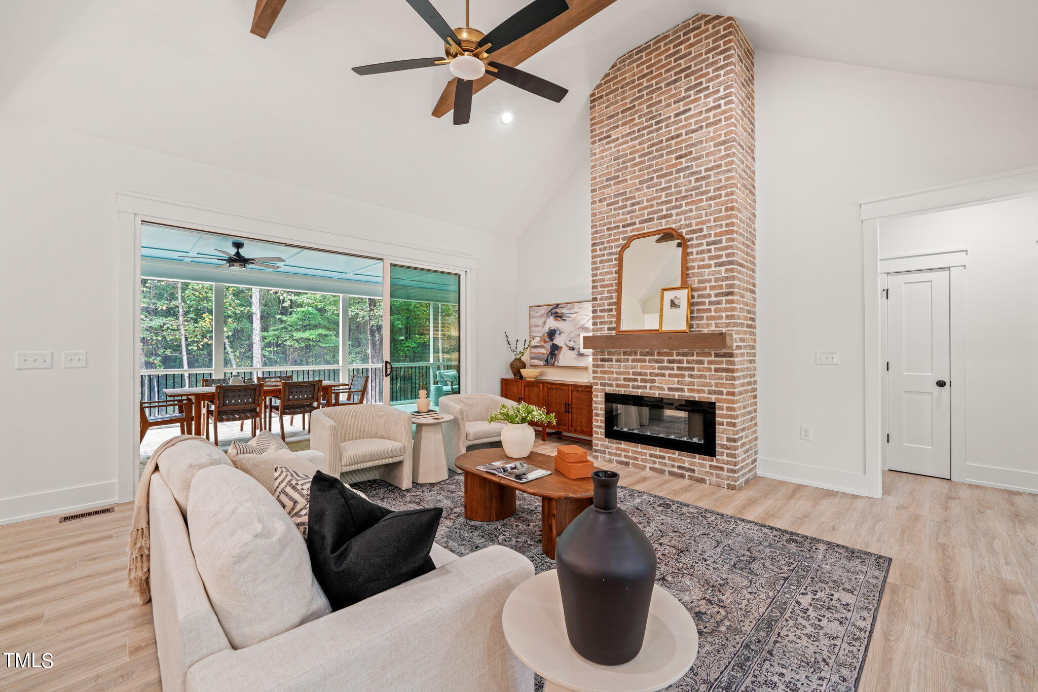 210 Pilot Ridge Road Zebulon, NC 27597 - Photo 9 of 46 a living room with furniture and a fireplace
