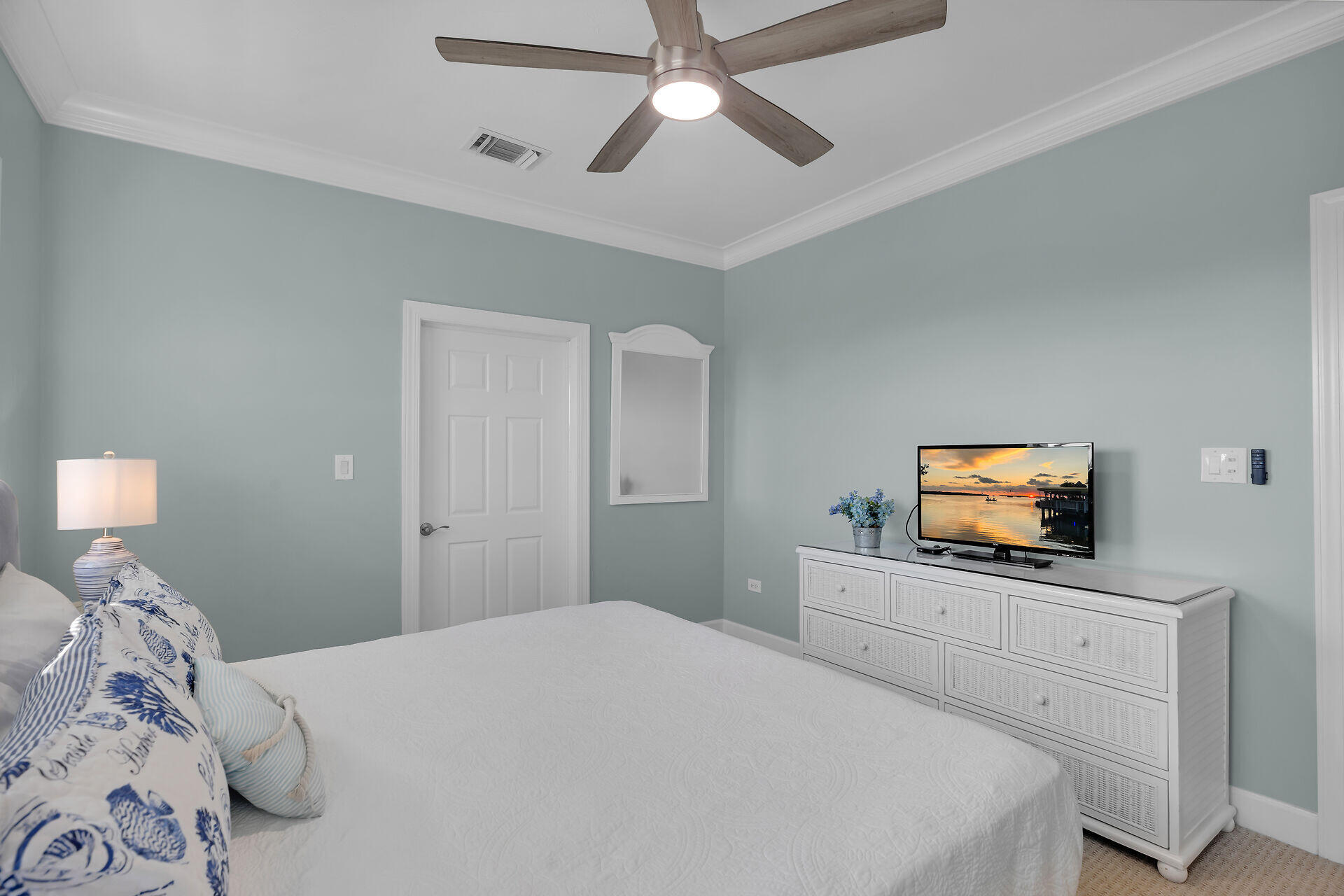 580-590 10th Street Key Colony Beach, FL 33051 - Photo 34 of 75 a bedroom with a bed and a flat screen tv