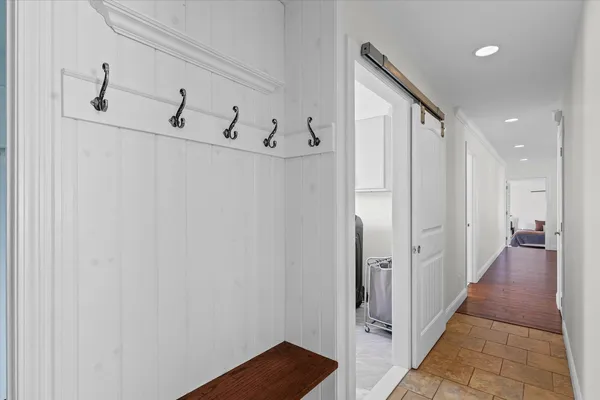 a view of a hallway with closet