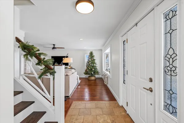 a view of a hallway view with staircase