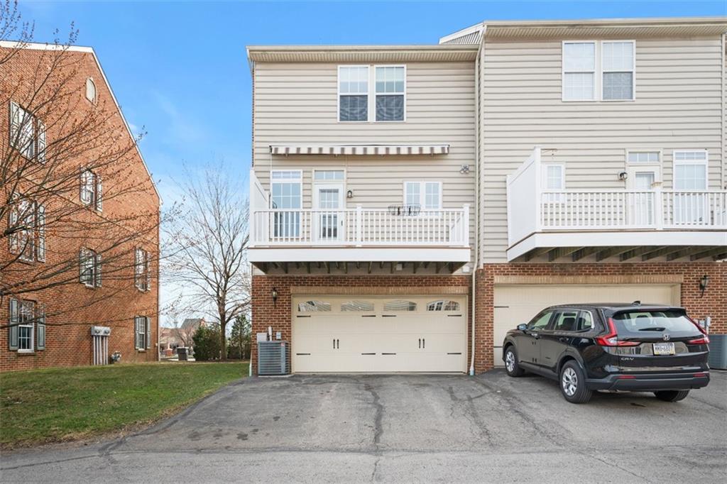 3009 Village Run Road Wexford, PA 15090 - Photo 29 of 32 End Unit with double Car Garage . Large Deck with Remote controlled Awning.