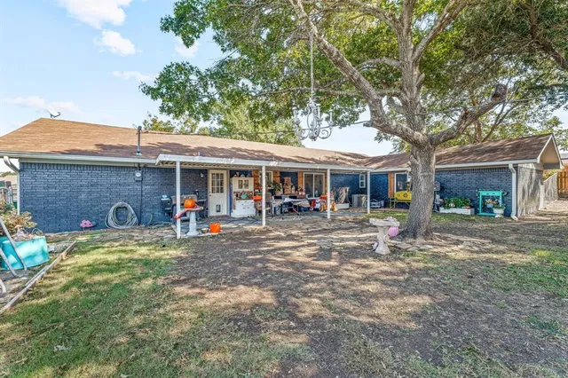 a front view of a house with a patio