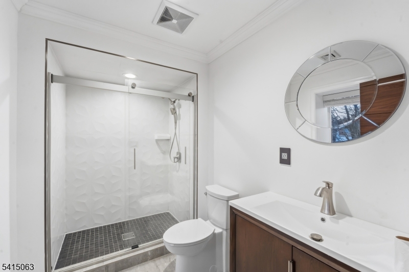 99 Ogle Road Old Tappan, NJ 07675 - Photo 27 of 35 a bathroom with a sink toilet and shower