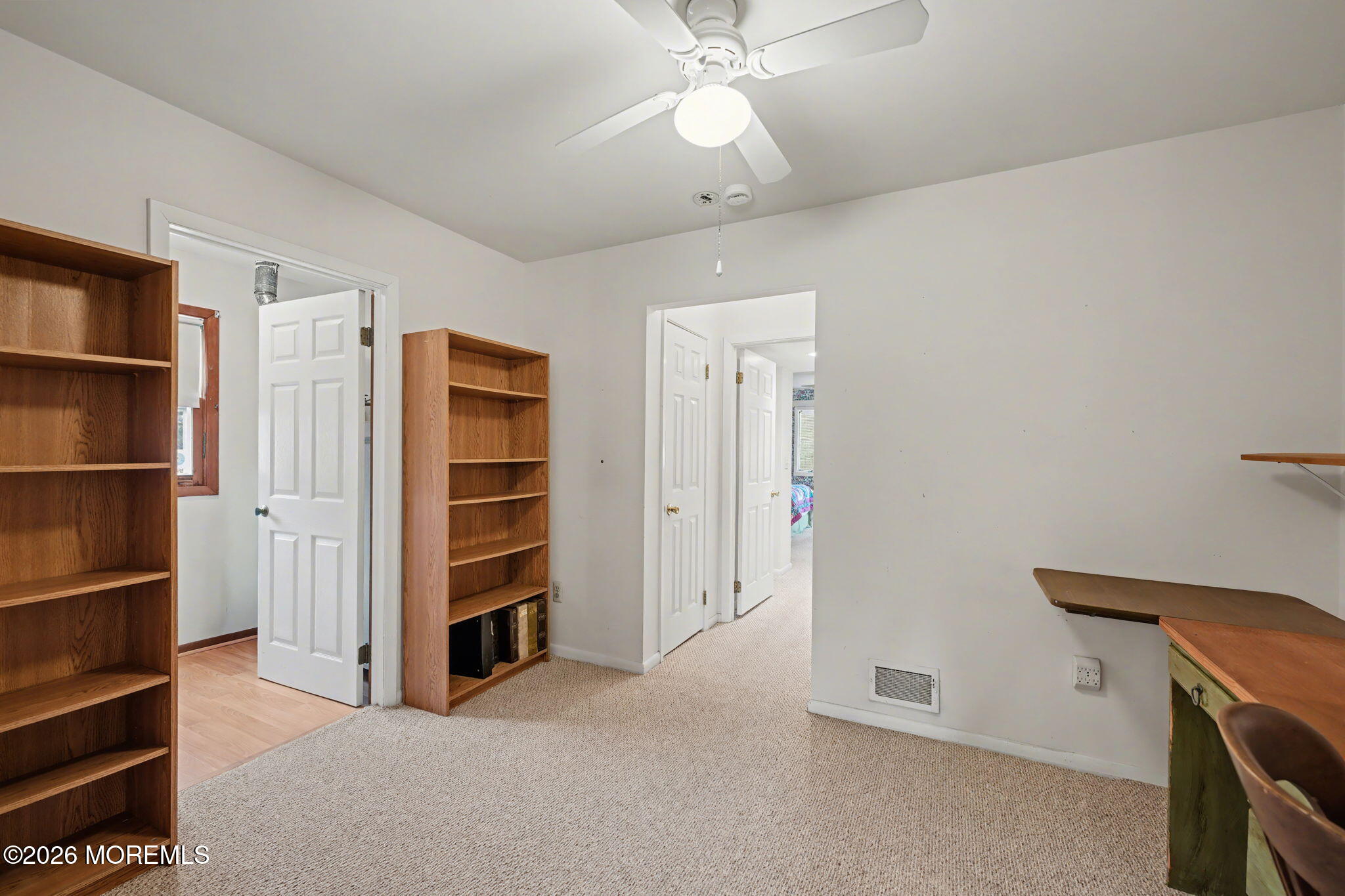 813 West Laurel Avenue Point Pleasant Beach, NJ 08742 - Photo 12 of 32 a view of an empty room with a cabinet and a window