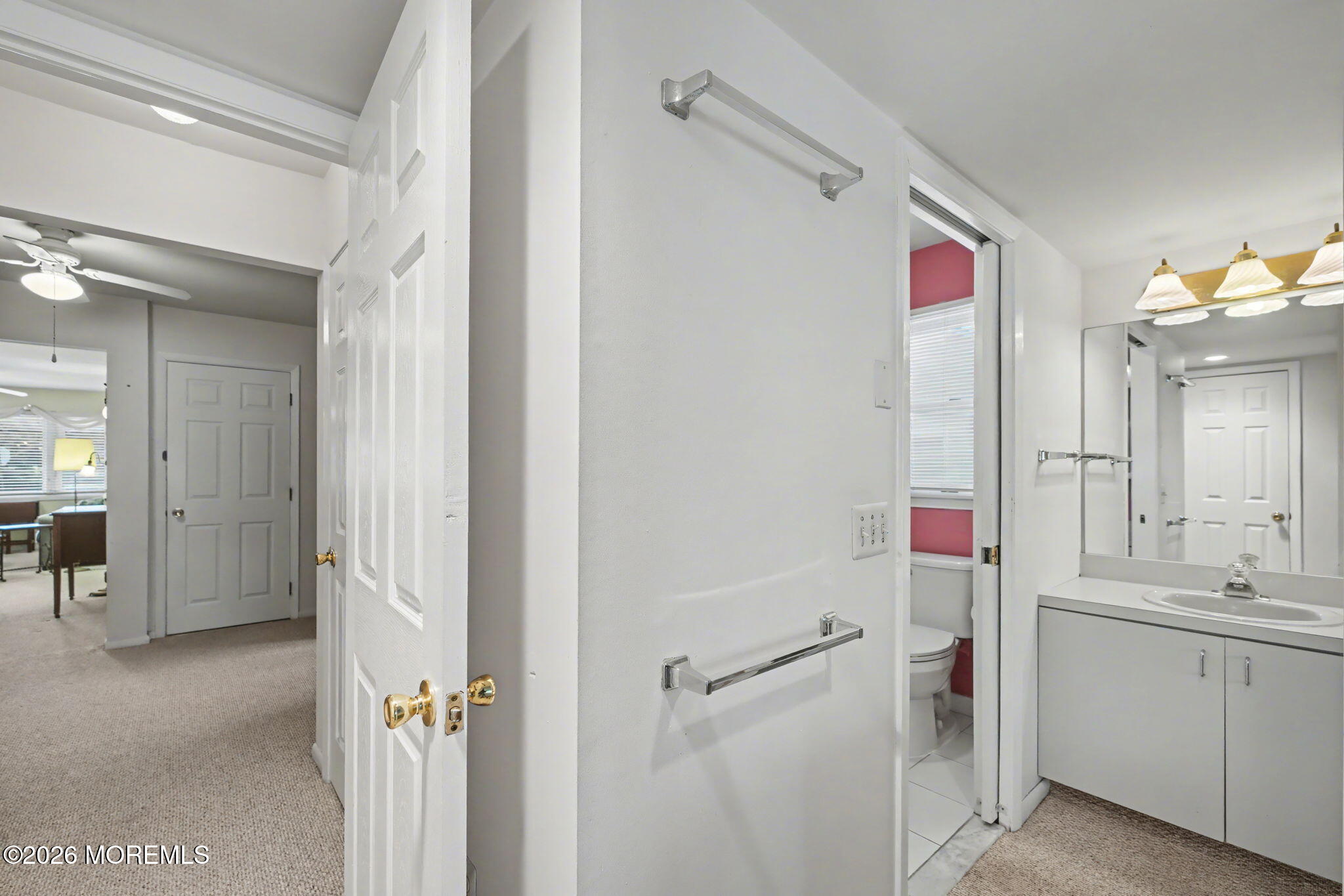813 West Laurel Avenue Point Pleasant Beach, NJ 08742 - Photo 18 of 32 a bathroom with a sink vanity and mirror