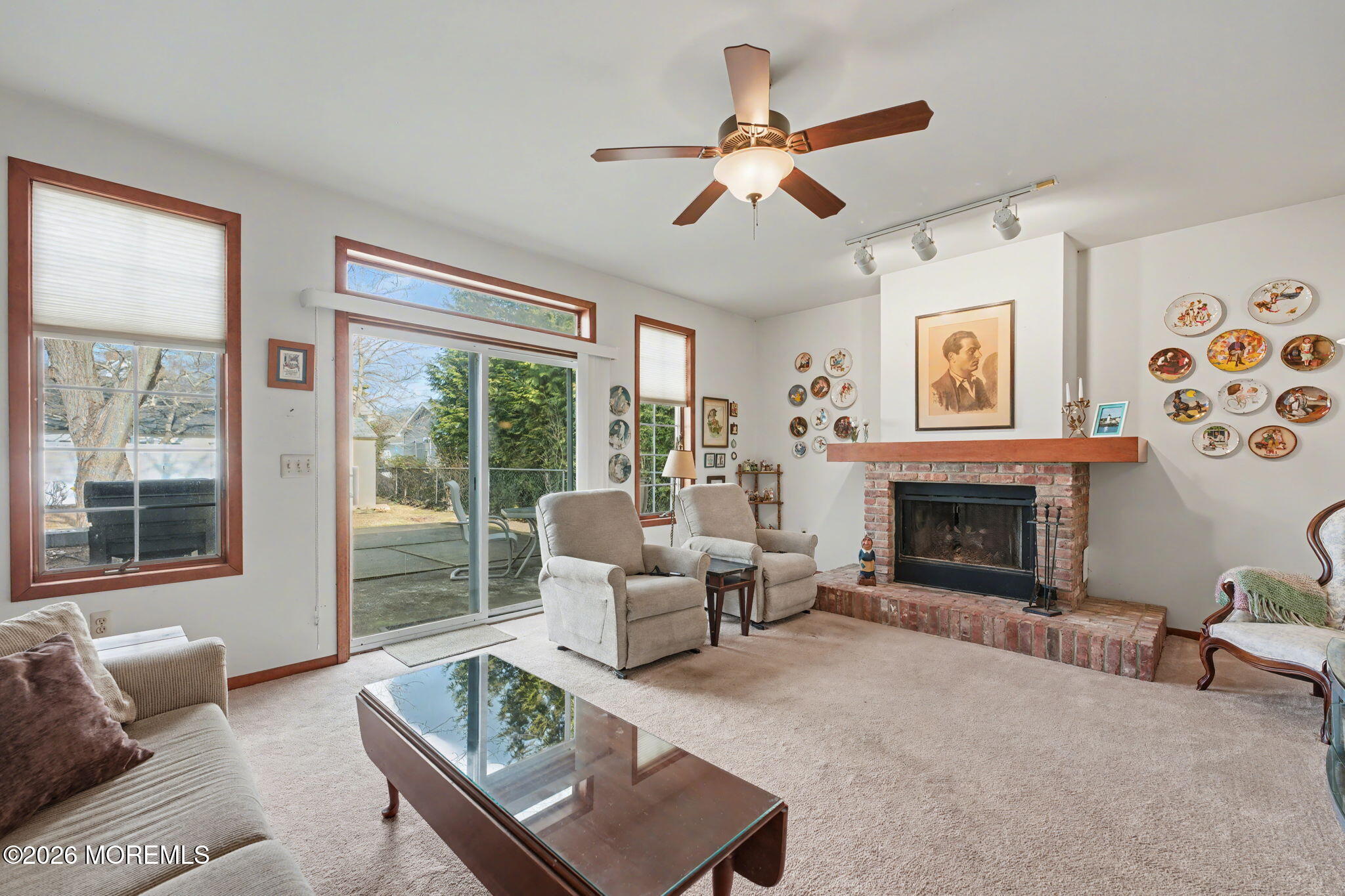 813 West Laurel Avenue Point Pleasant Beach, NJ 08742 - Photo 24 of 32 a living room with furniture fireplace and a large window