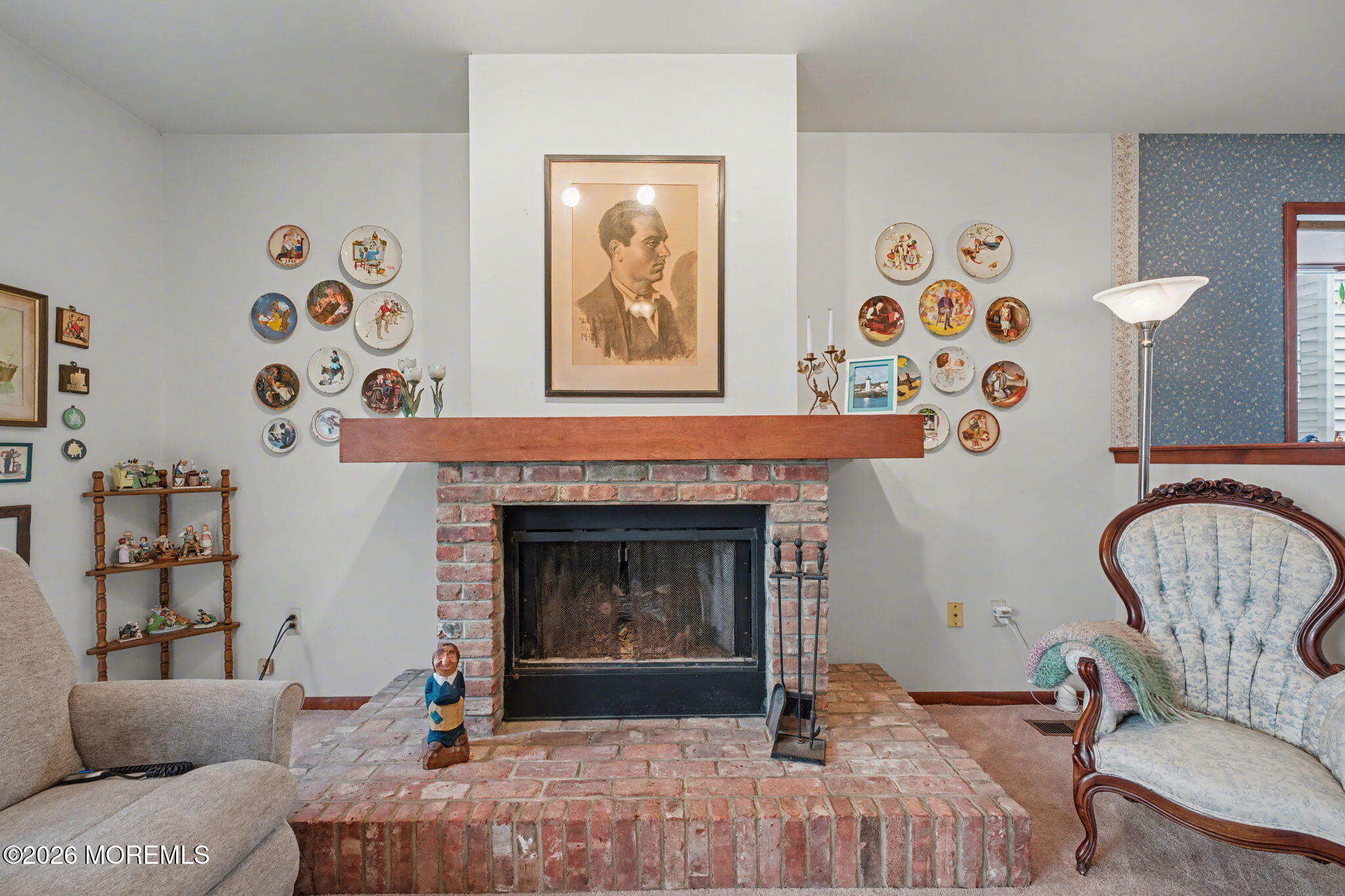 813 West Laurel Avenue Point Pleasant Beach, NJ 08742 - Photo 26 of 32 a living room with furniture and a fireplace