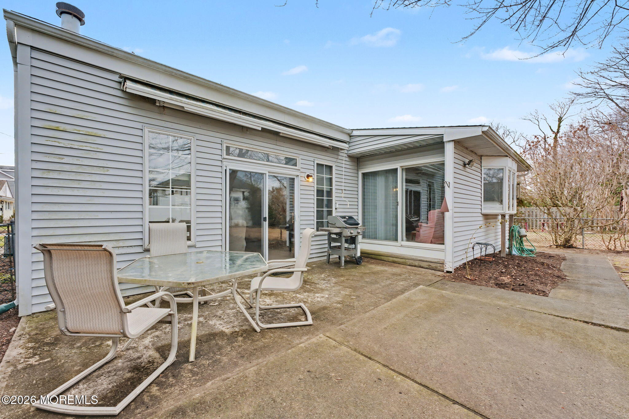 813 West Laurel Avenue Point Pleasant Beach, NJ 08742 - Photo 28 of 32 a view of a chair and tables in the patio