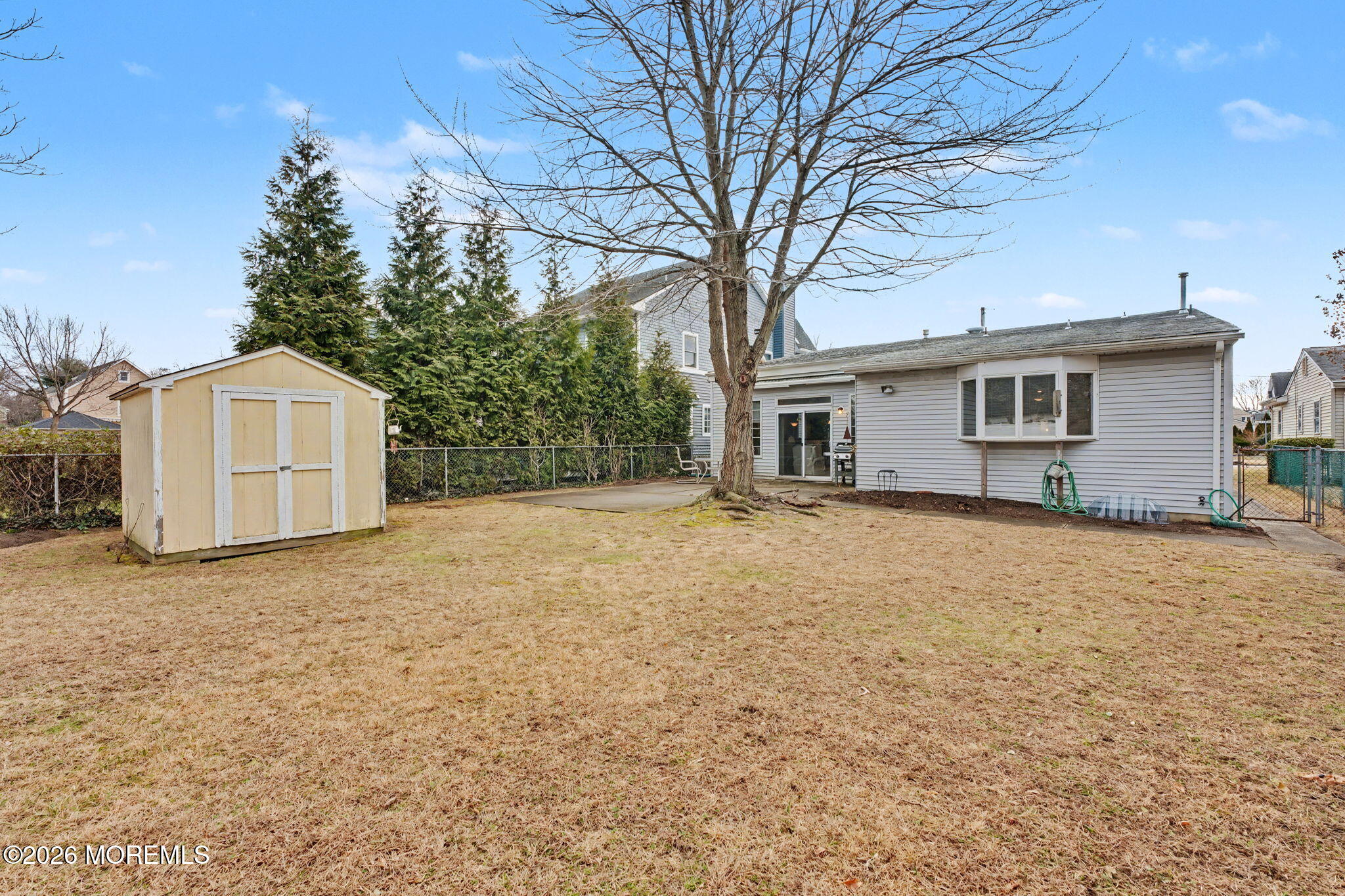 813 West Laurel Avenue Point Pleasant Beach, NJ 08742 - Photo 30 of 32 a house with trees in front of it
