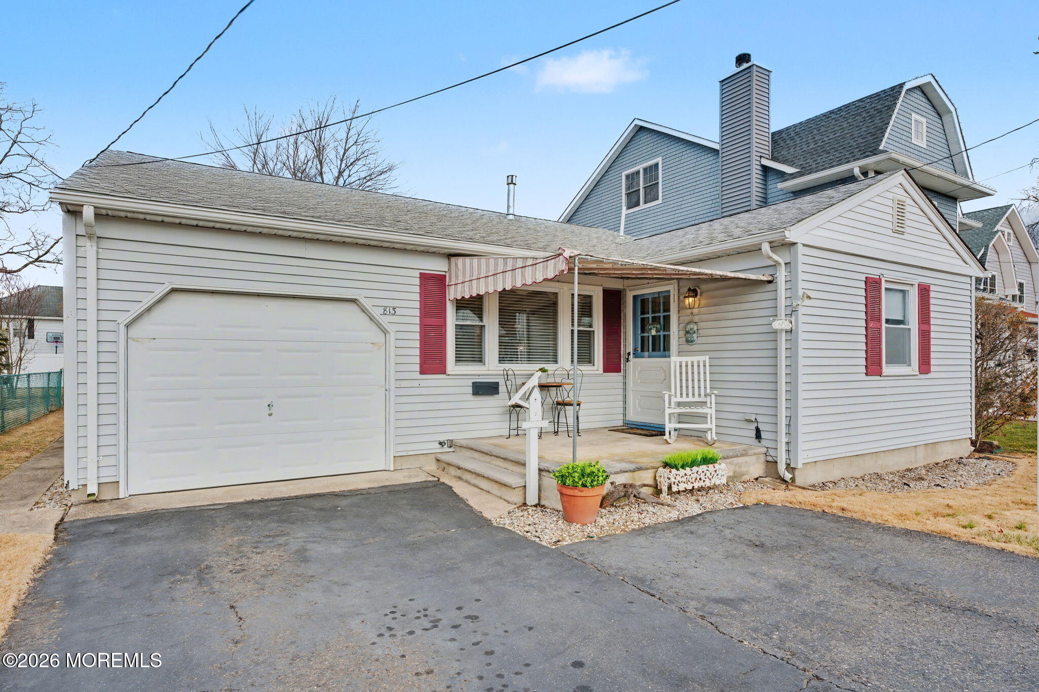 813 West Laurel Avenue Point Pleasant Beach, NJ 08742 - Photo 3 of 32 a front view of house with outdoor seating and garage