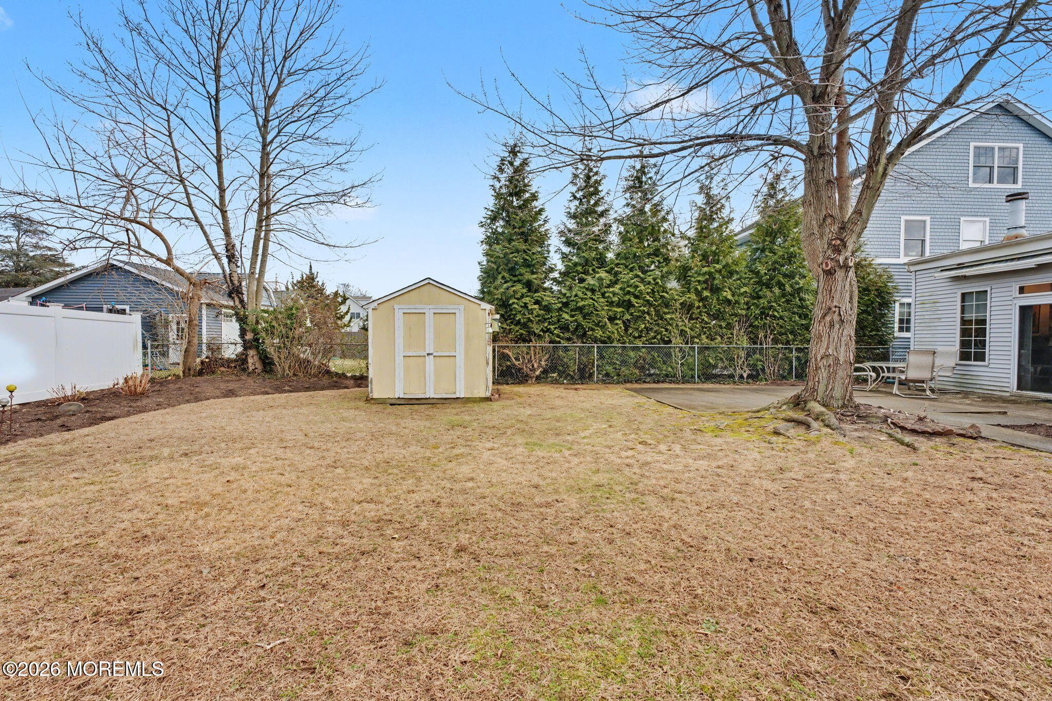813 West Laurel Avenue Point Pleasant Beach, NJ 08742 - Photo 31 of 32 a house with trees in front of it