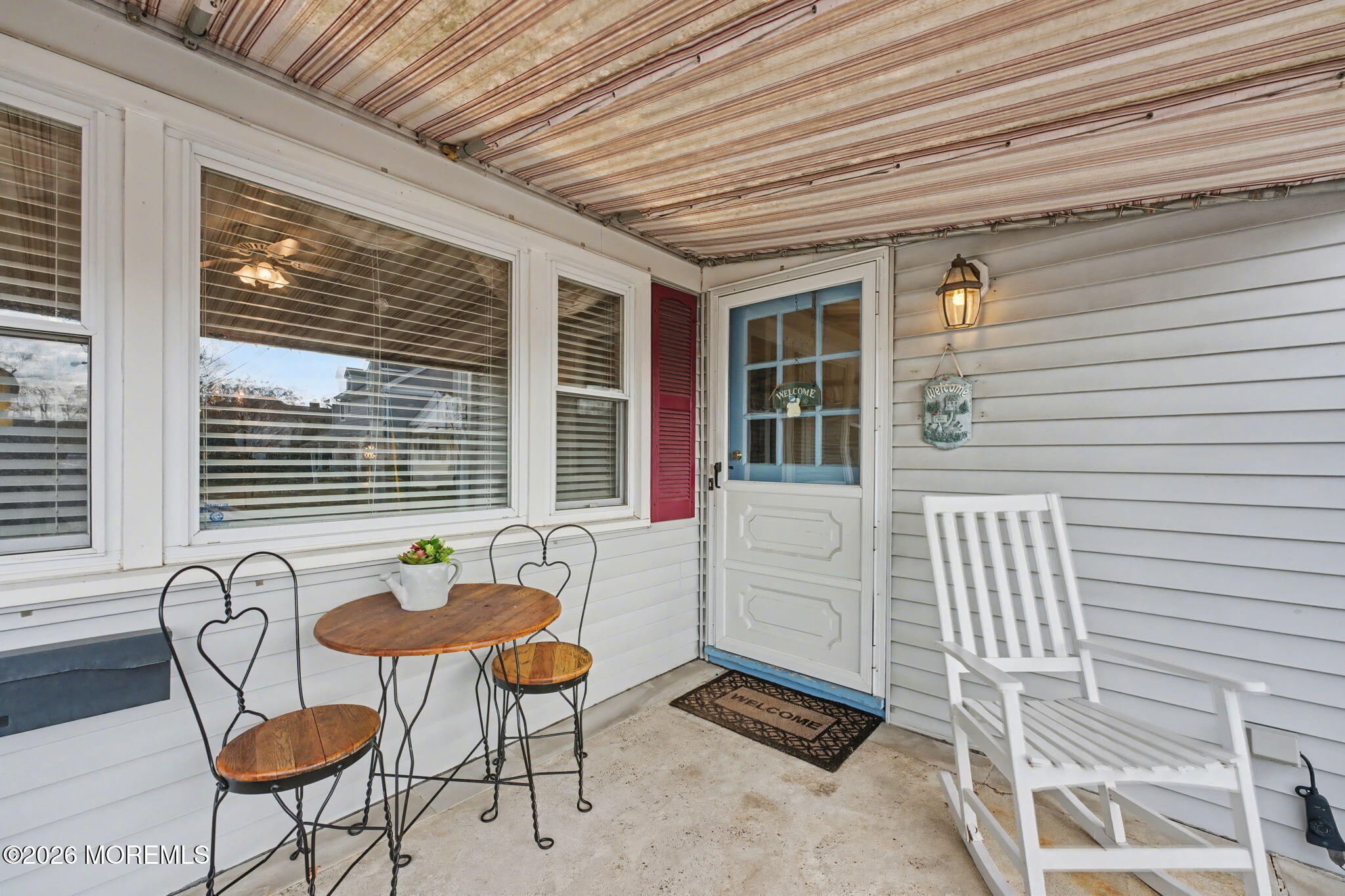 813 West Laurel Avenue Point Pleasant Beach, NJ 08742 - Photo 4 of 32 a backyard of a house with table and chairs
