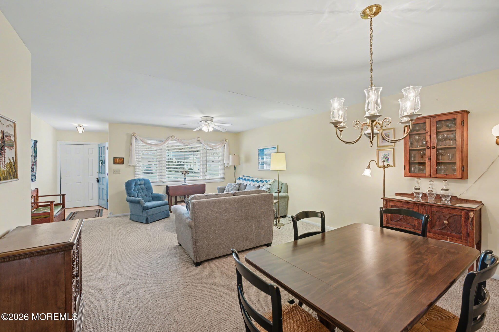 813 West Laurel Avenue Point Pleasant Beach, NJ 08742 - Photo 8 of 32 a view of a dining room with furniture a chandelier and wooden floor