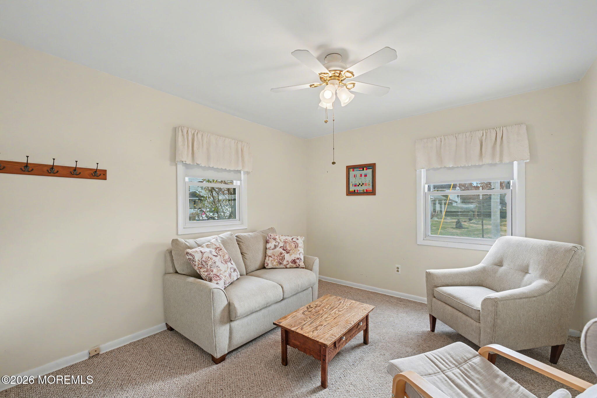 813 West Laurel Avenue Point Pleasant Beach, NJ 08742 - Photo 9 of 32 a living room with furniture and a window