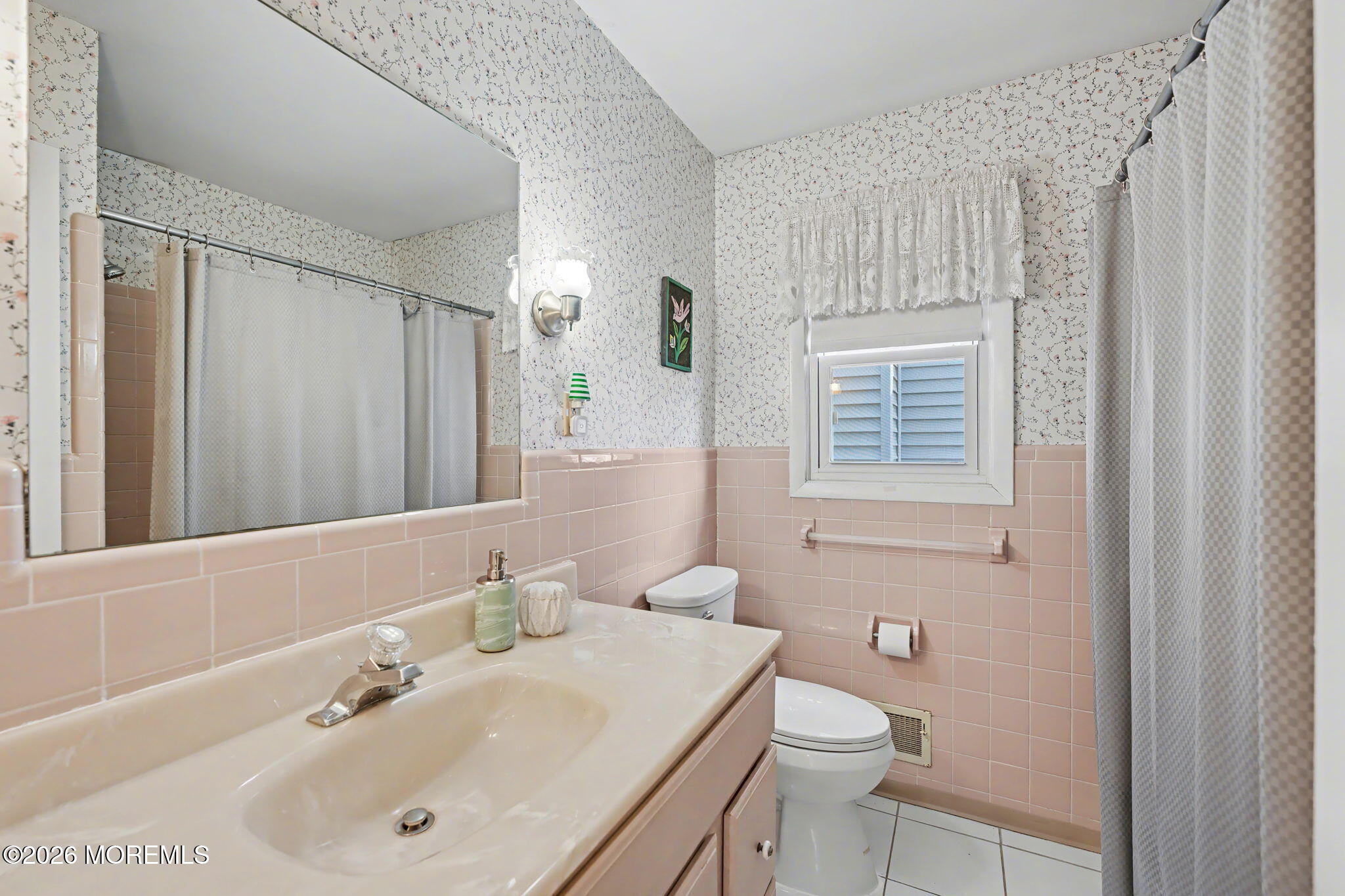 813 West Laurel Avenue Point Pleasant Beach, NJ 08742 - Photo 10 of 32 a bathroom with a sink a toilet and shower