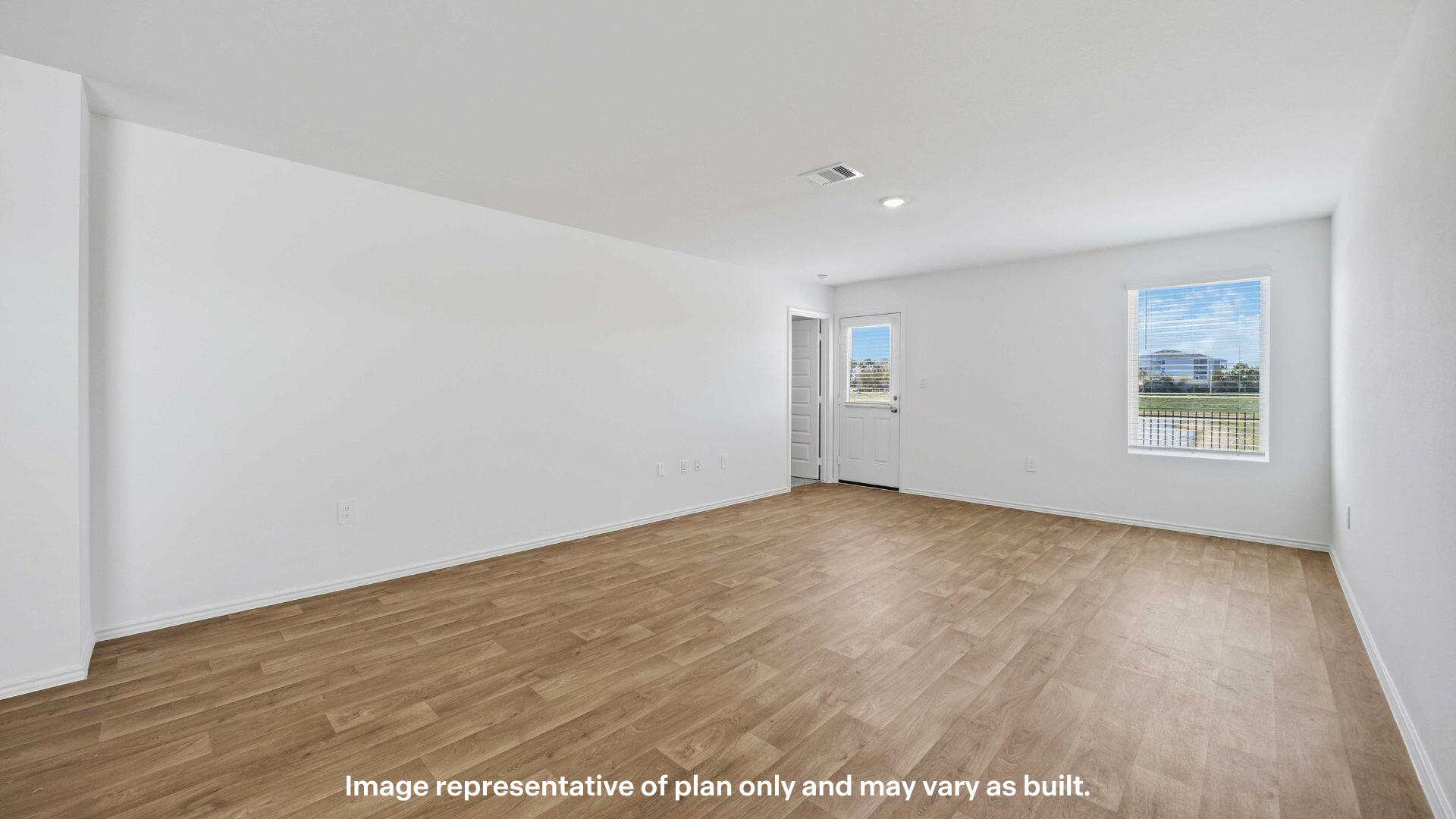 7441 10th Street Lubbock, TX 79416 - Photo 17 of 25 an empty room with wooden floor and windows