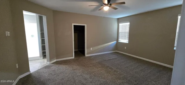 a bathroom with a shower and sink