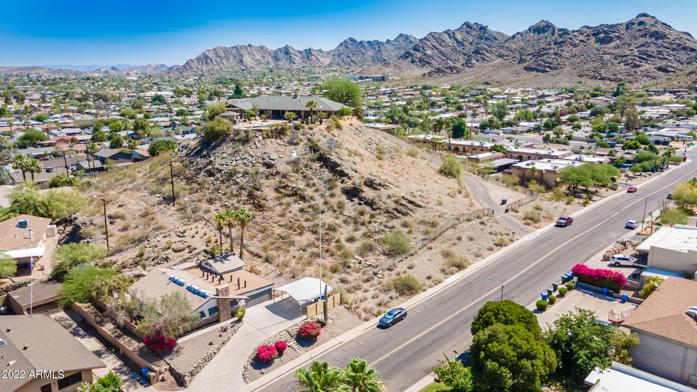 1036 East Butler Drive Phoenix, AZ 85020 - Photo 22 of 25 an aerial view of residential houses with outdoor space