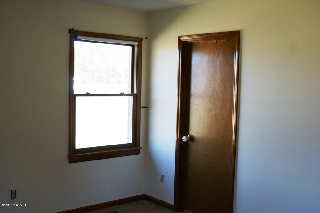167 Peletier Loop Road Swansboro, NC 28584 - Photo 20 of 29 11-11 X 13-11 Showing door to Master Bath