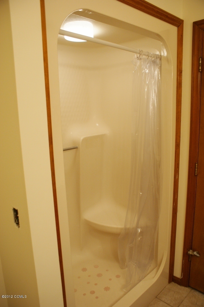 167 Peletier Loop Road Swansboro, NC 28584 - Photo 23 of 29 Shower Seat