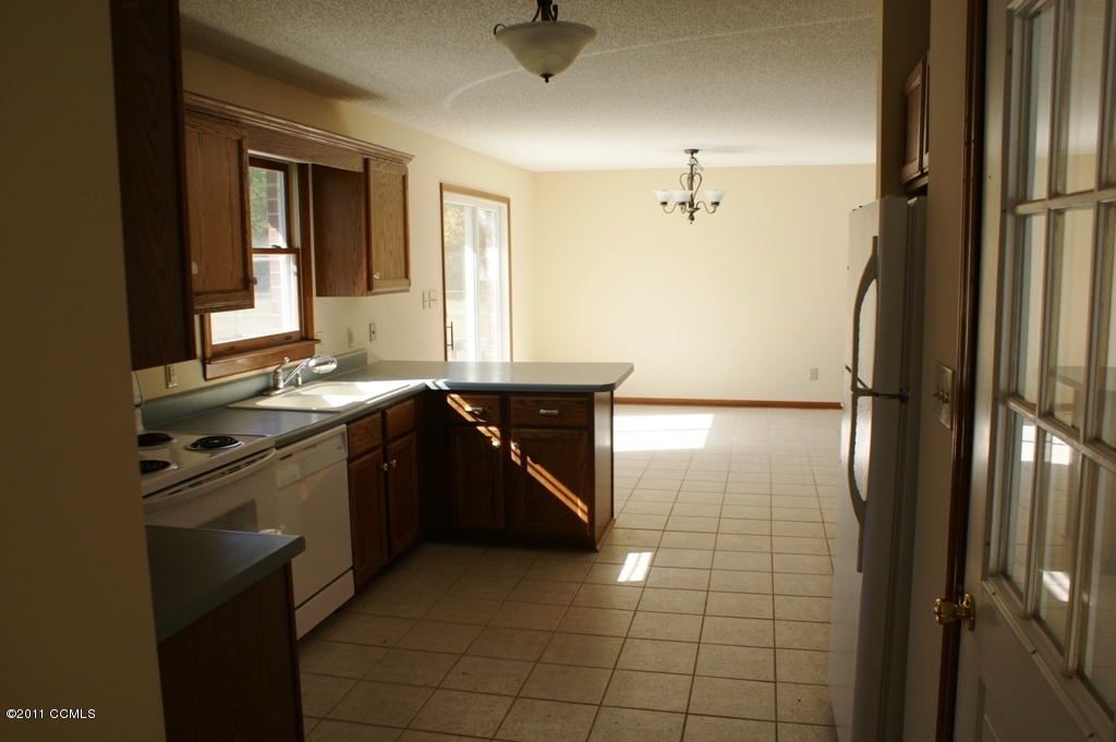 167 Peletier Loop Road Swansboro, NC 28584 - Photo 6 of 29 View From Laundry Room, Note Door From Garage