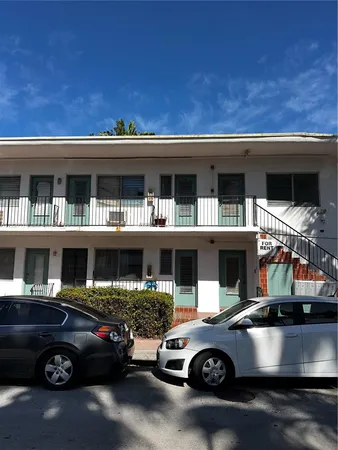 a car parked in front of a house